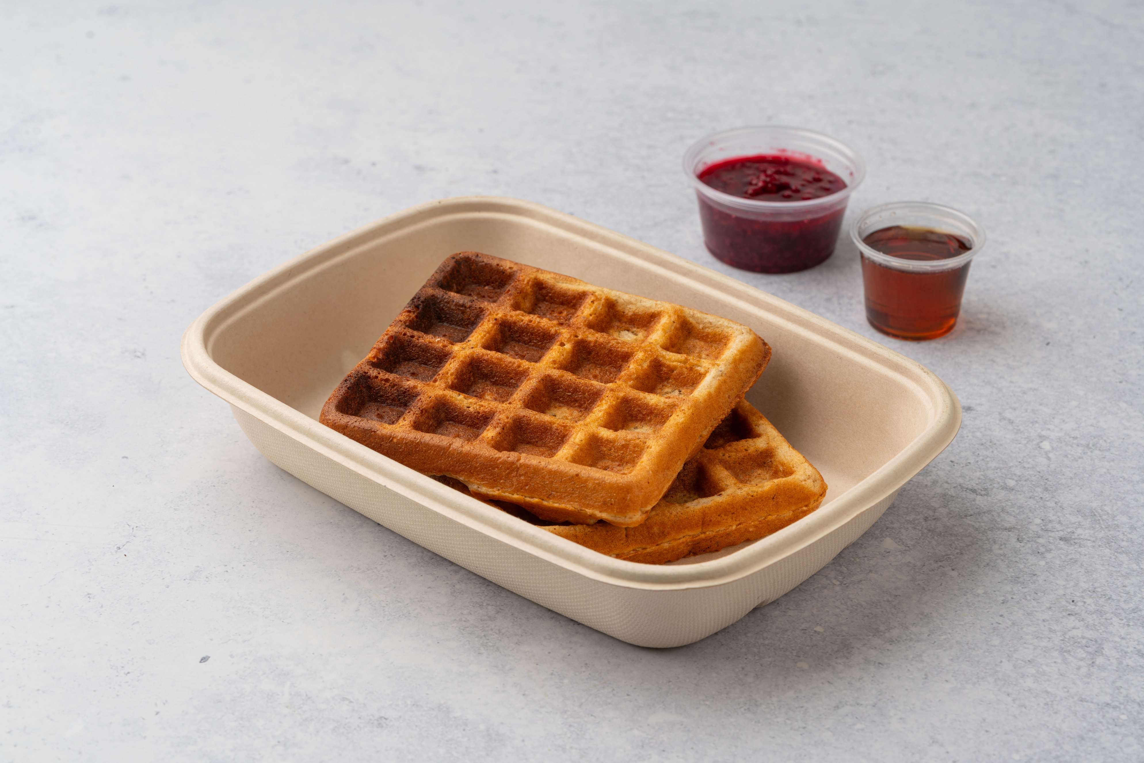 Healthy Belgian Waffle With Homemade Strawberry Jam And Maple Syrup